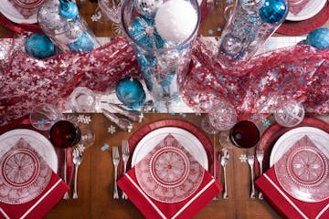 A holiday tablescape set by Amy Leyden of Kaleidoscope Table Settings.