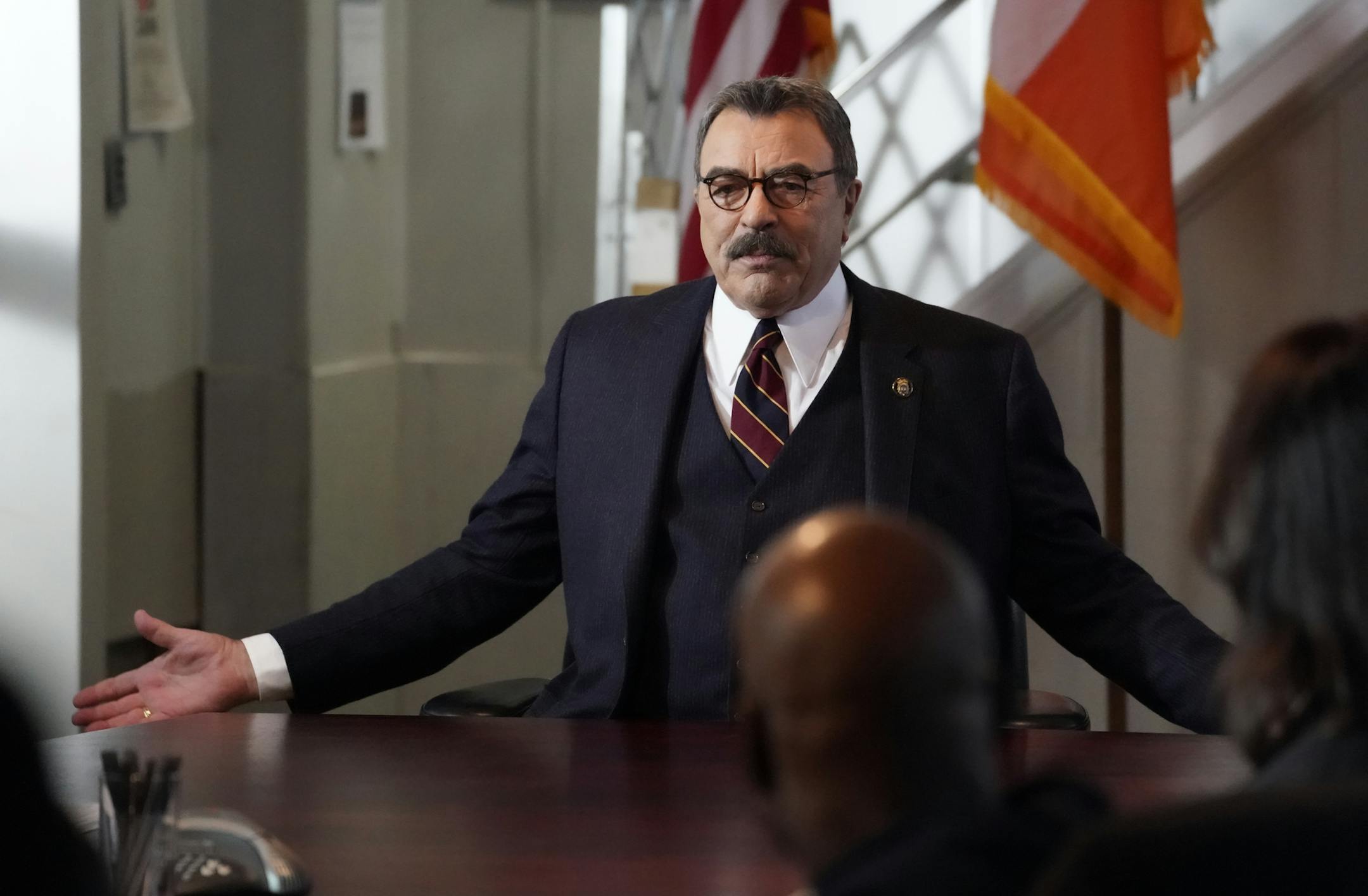 This image released by CBS shows Tom Selleck in a scene from "Blue Bloods." TV viewers craving familiarity will find it on CBS, which is renewing nearly two-dozen including newcomers "The Unicorn" and "All Rise" and stalwarts "Blue Bloods" and "The Amazing Race." CBS said Wednesday, May 6, 2020, the 23 returning shows will be part of the network's lineup for the 2020-21 season, along with new series to be unveiled in the coming weeks. (John Paul Filo/CBS via AP)