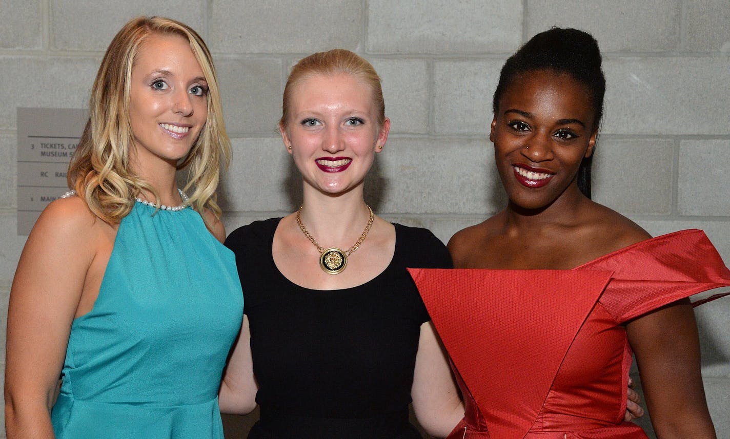 Featured U student designer Marissa Lynch, center, with &#xad;models Ashley Bergheys, left, and Renae Prater.