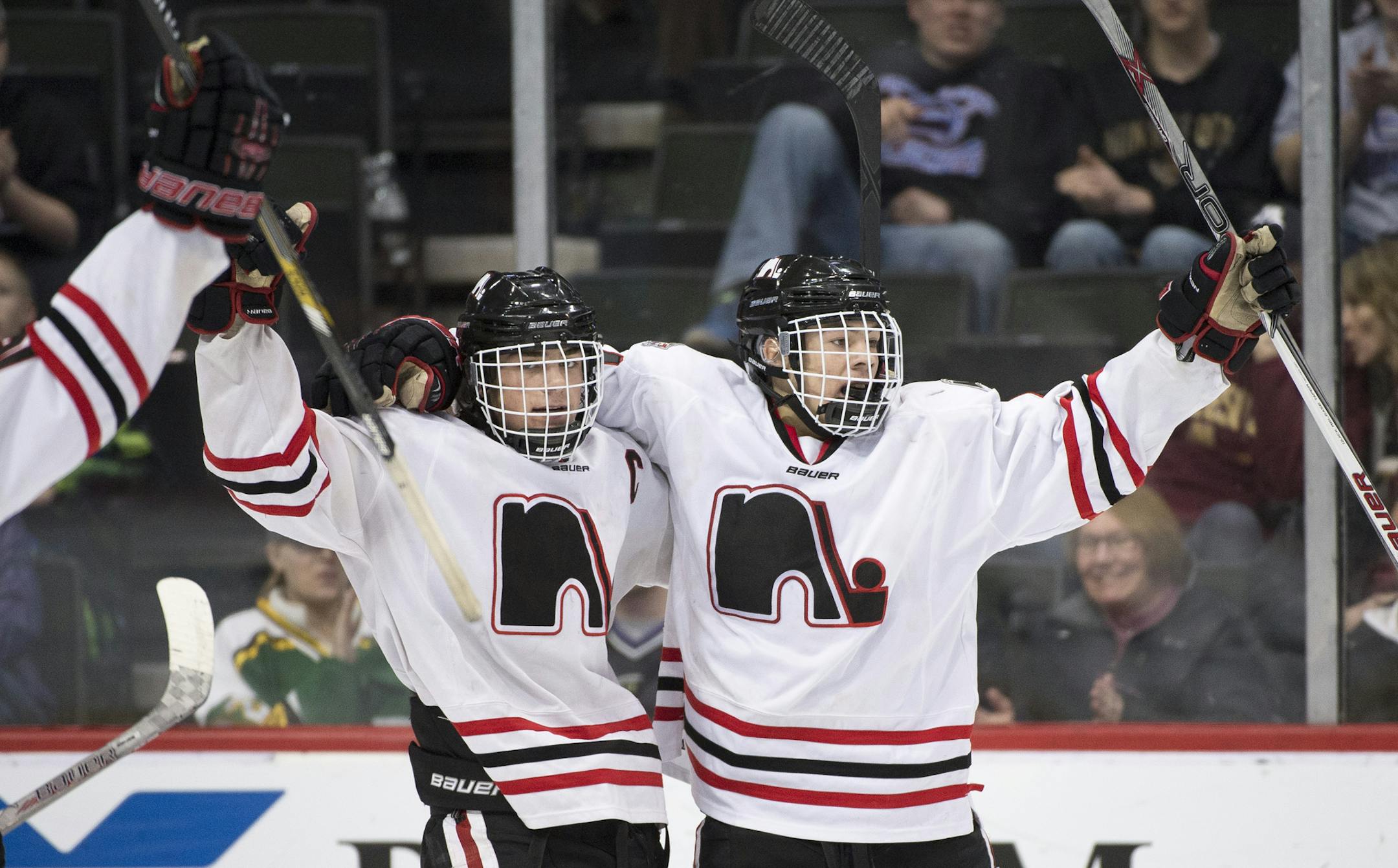 Lakeville North forward Jack Poehling (3), left, celebrates a goal with his teammates in the second period against Duluth East. ] (Aaron Lavinsky | StarTribune) Duluth East plays Lakeville North in the Class 2A boys' hockey championship game on Saturday, March 7, 2015 at Xcel Energy Center.