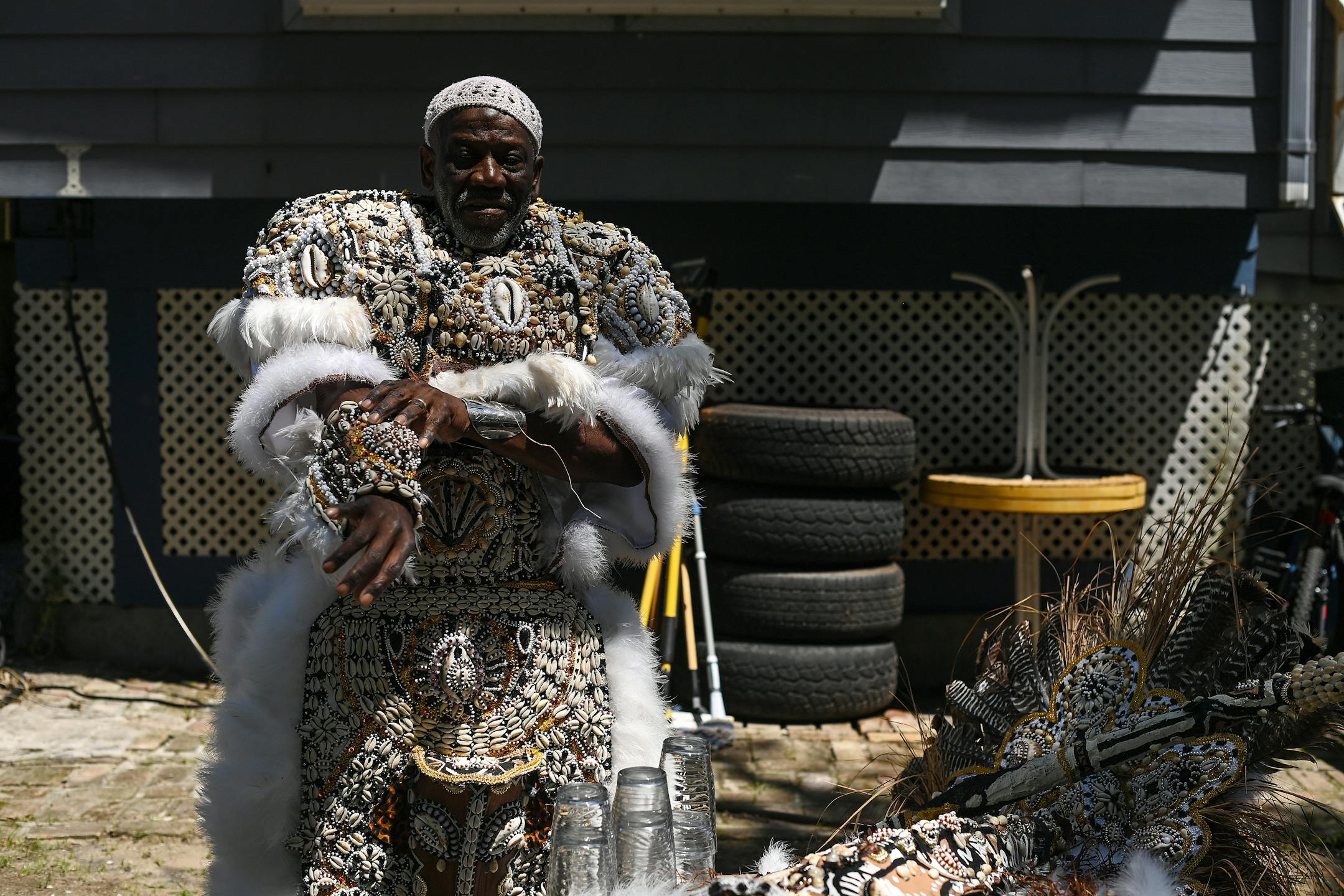 Victor Harris, the Spirit of Fi Yi Yi and big chief of the Mandingo Warriors, poses in his tribal suit on April 27 in New Orleans. Harris shows off his Fi Yi Yi sliver cuff. Shells and beads adorn the tribal suit worn by Victor Harris on April 27. Harris pulls on the arm piece to his tribal suit. MUST CREDIT: Washington Post photo by Joshua Lott