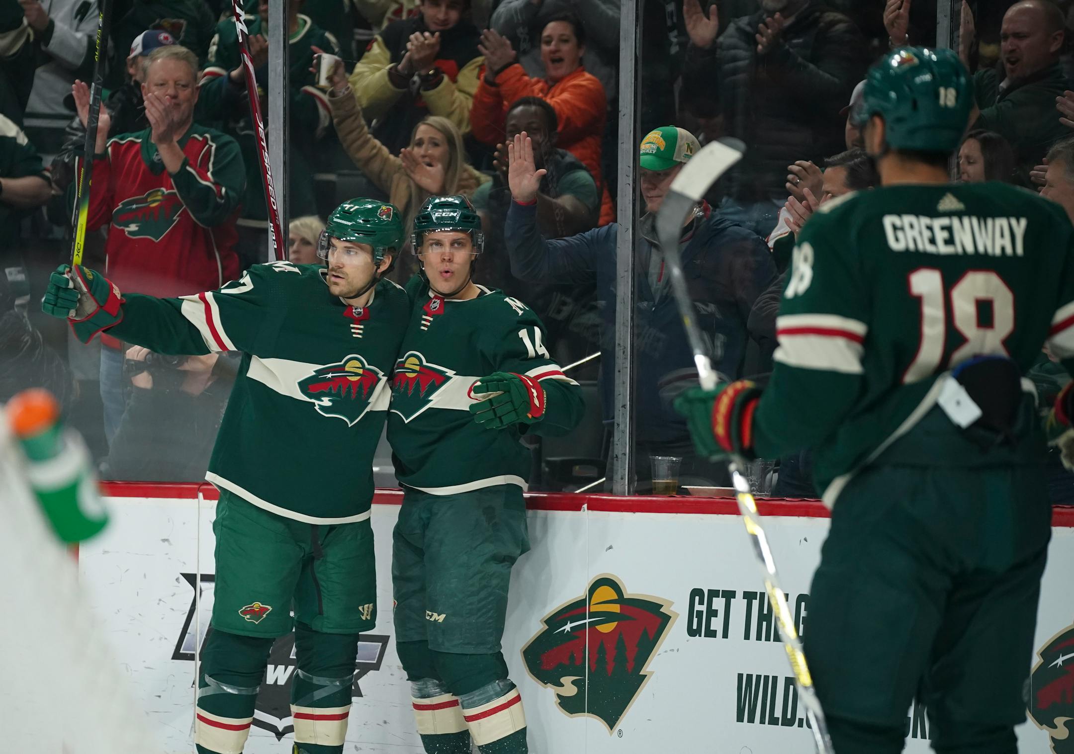 Minnesota Wild center Joel Eriksson Ek (14) celebrated his first period goal with teammate Marcus Foligno (17), while Jordan Greenway (18) skated to join them. ] JEFF WHEELER • Jeff.Wheeler@startribune.com