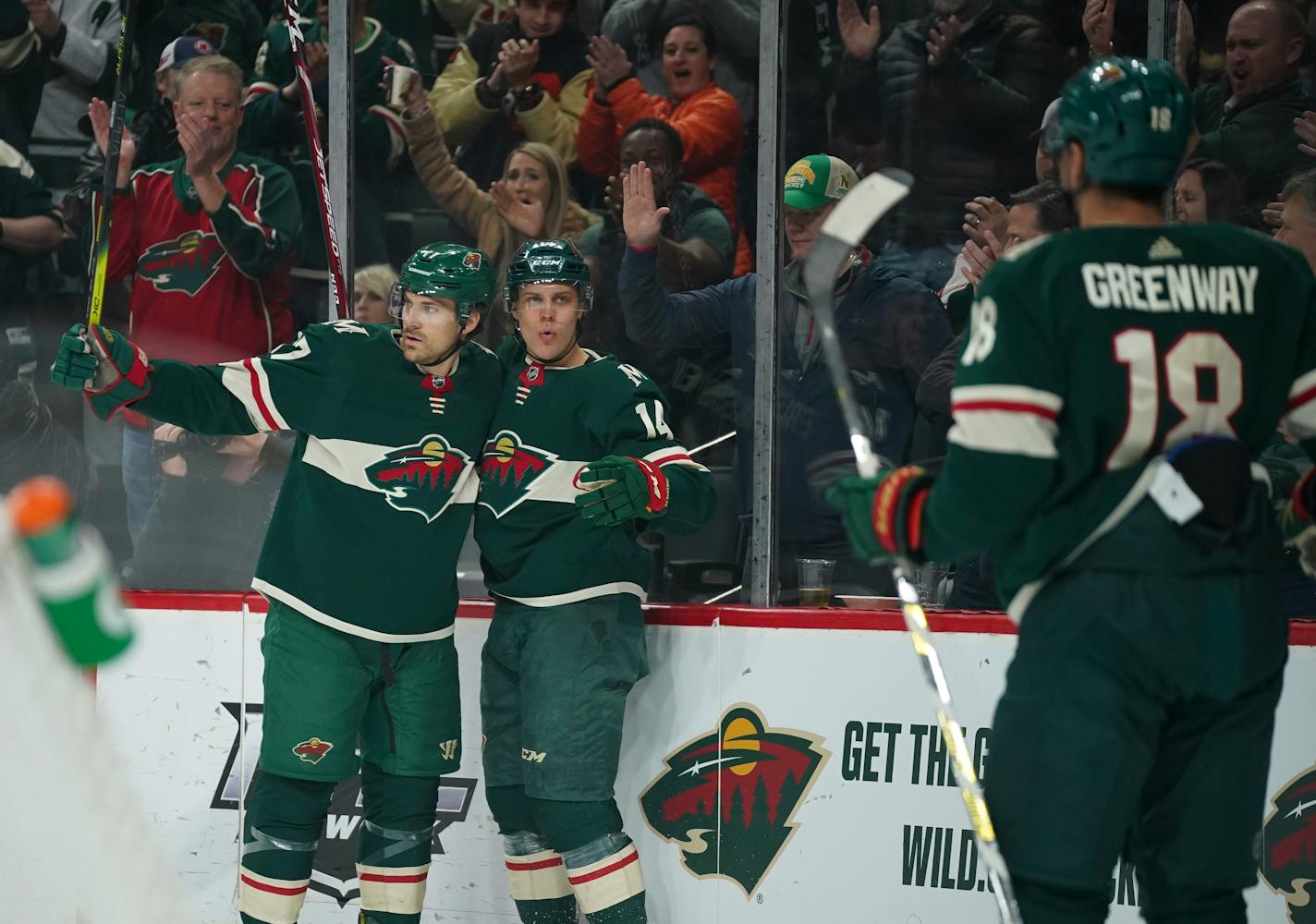 Minnesota Wild center Joel Eriksson Ek (14) celebrated his first period goal with teammate Marcus Foligno (17), while Jordan Greenway (18) skated to join them. ] JEFF WHEELER • Jeff.Wheeler@startribune.com