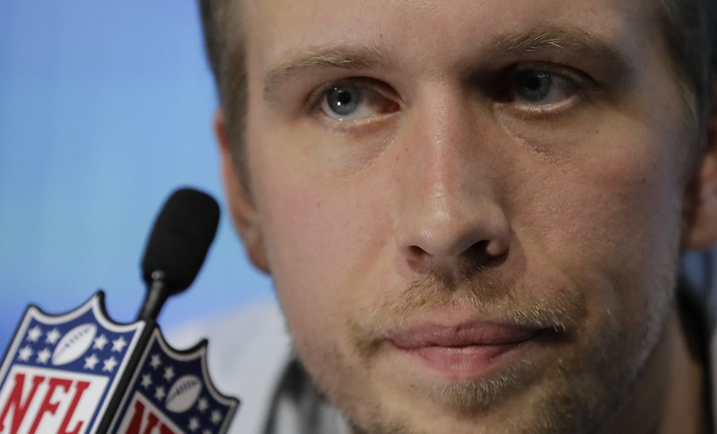 Philadelphia Eagles' Nick Foles listens to a question during NFL football Super Bowl 52 Opening Night Monday, Jan. 29, 2018, at the Xcel Center in St. Paul, Minn. (AP Photo/Eric Gay) ORG XMIT: MNMG181