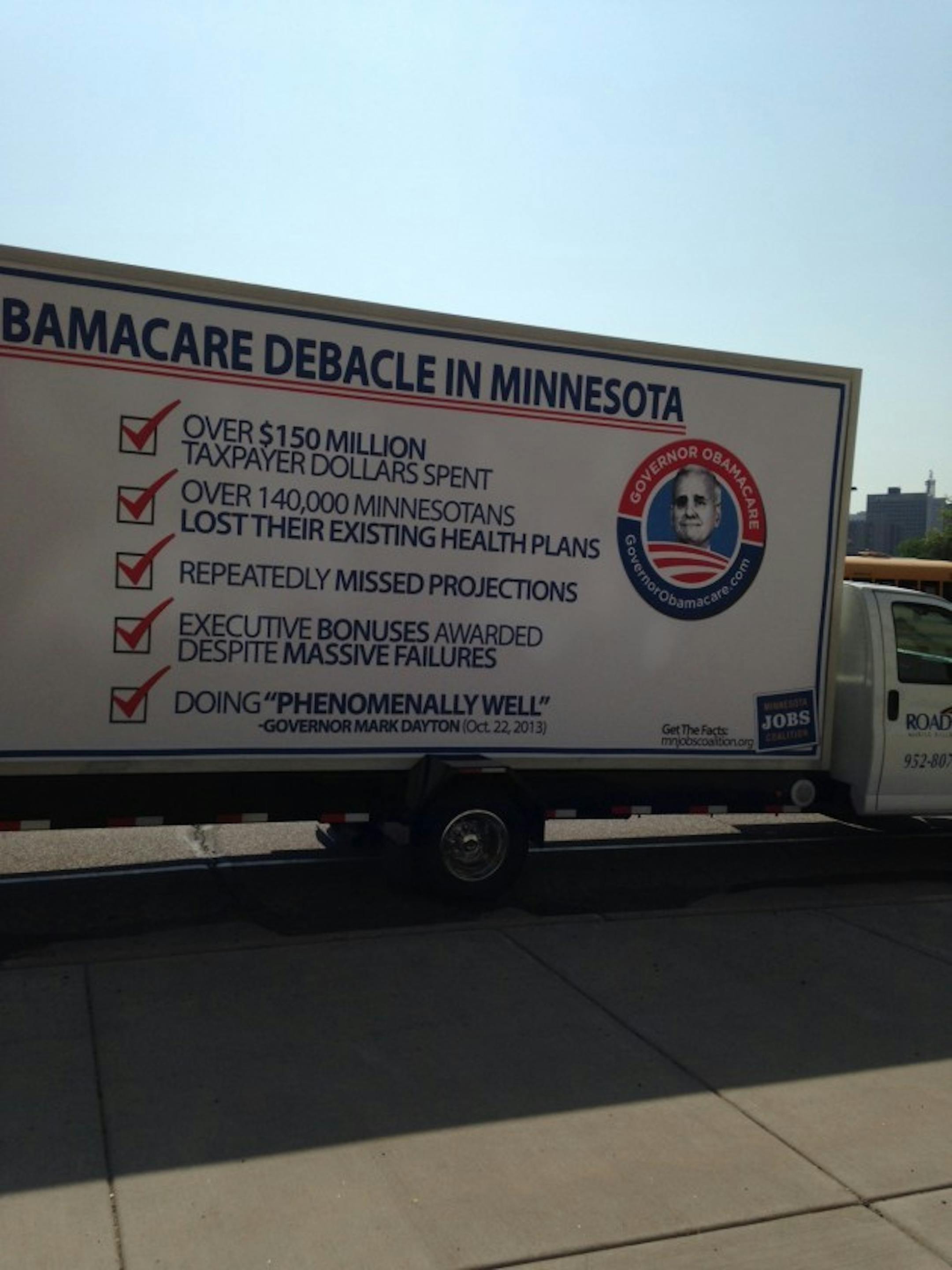 Truck greeting Gov. Mark Dayton outside Secretary of State's office.