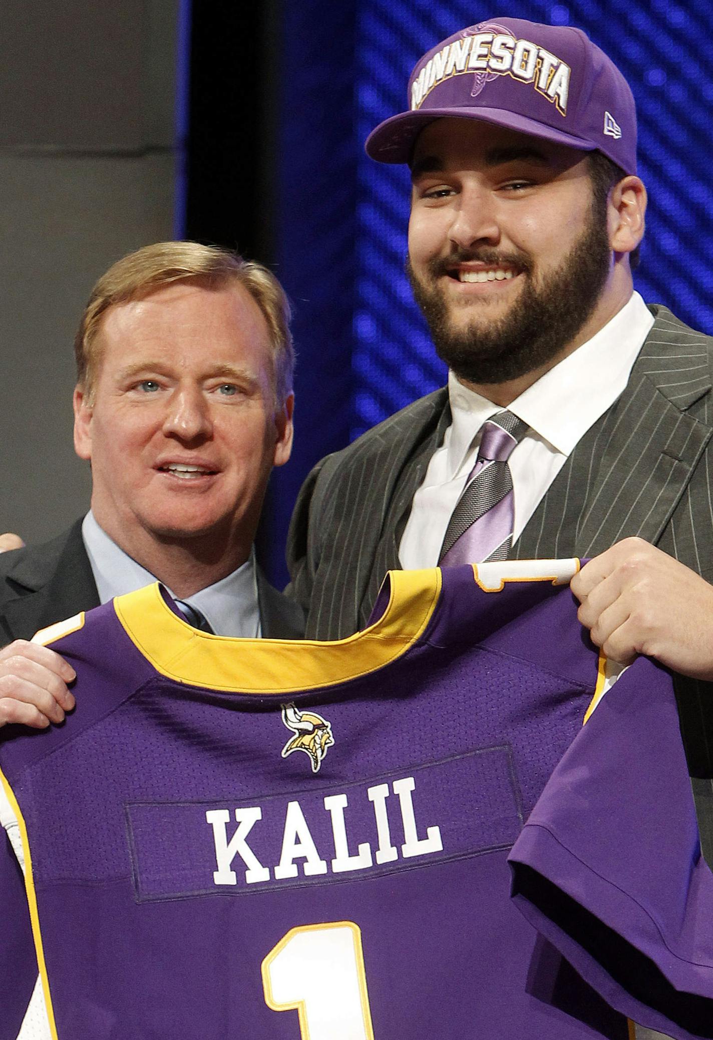 Southern California offensive lineman Matt Kalil, right, poses for photographs with NFL Commissioner Roger Goodell after being selected as the fourth pick overall by the Minnesota Vikings in the first round of the NFL football draft at Radio City Music Hall, Thursday, April 26, 2012, in New York. (AP Photo/Jason DeCrow)