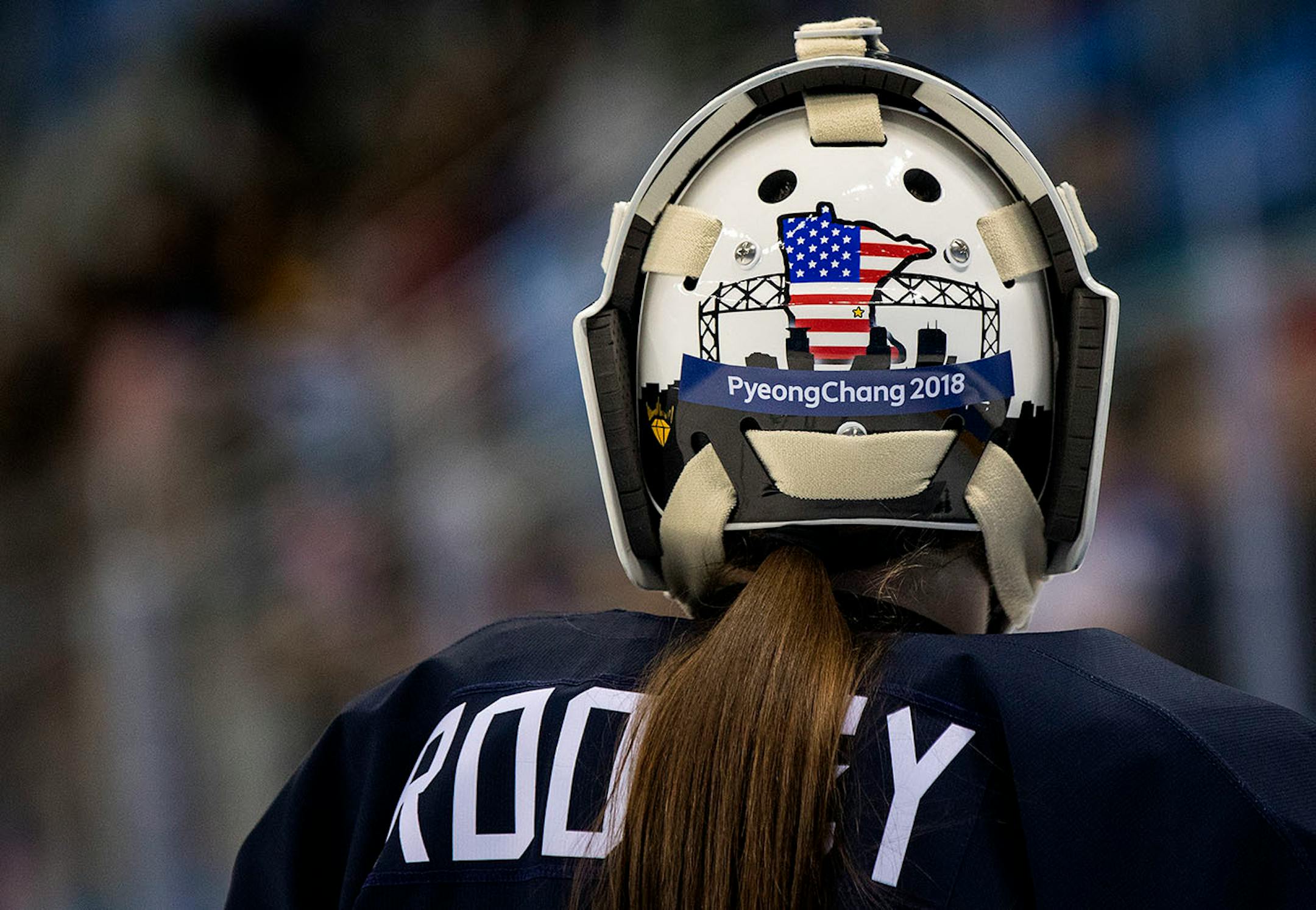 The Minnesota and Duluth themed mask of USA goalie Maddie Rooney (35).