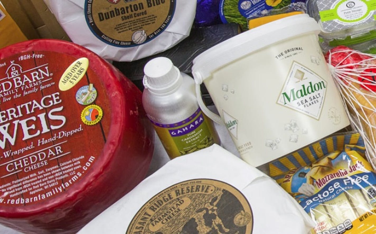 Some of the cheeses and other food distributed by Plymouth-based Classic Provisions, which was purchased this week by the parent company of Fortune Fish & Gourmet.