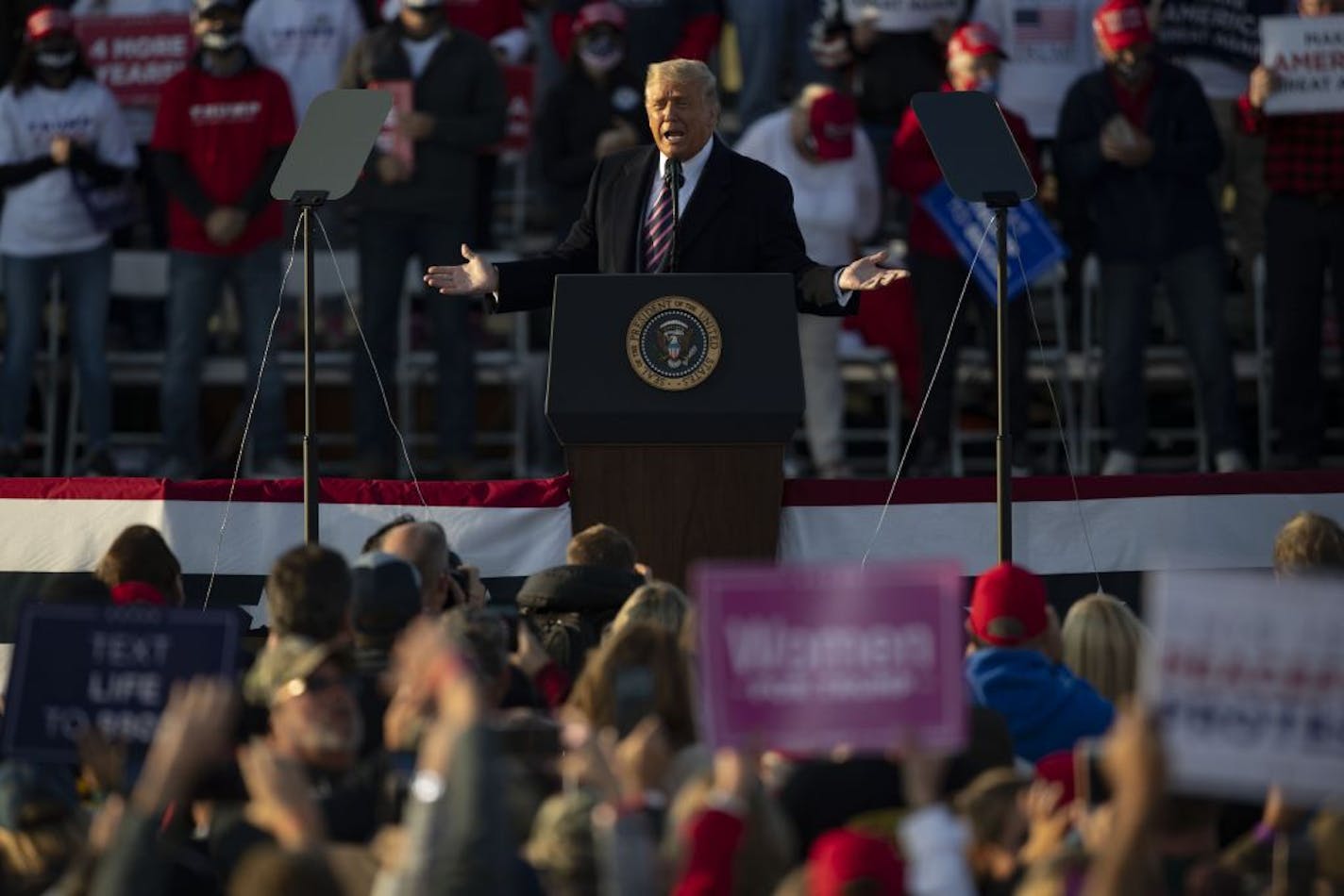 President Trump addressed a crowd of thousands of supporters at Bemidji Aviation Service on Friday.