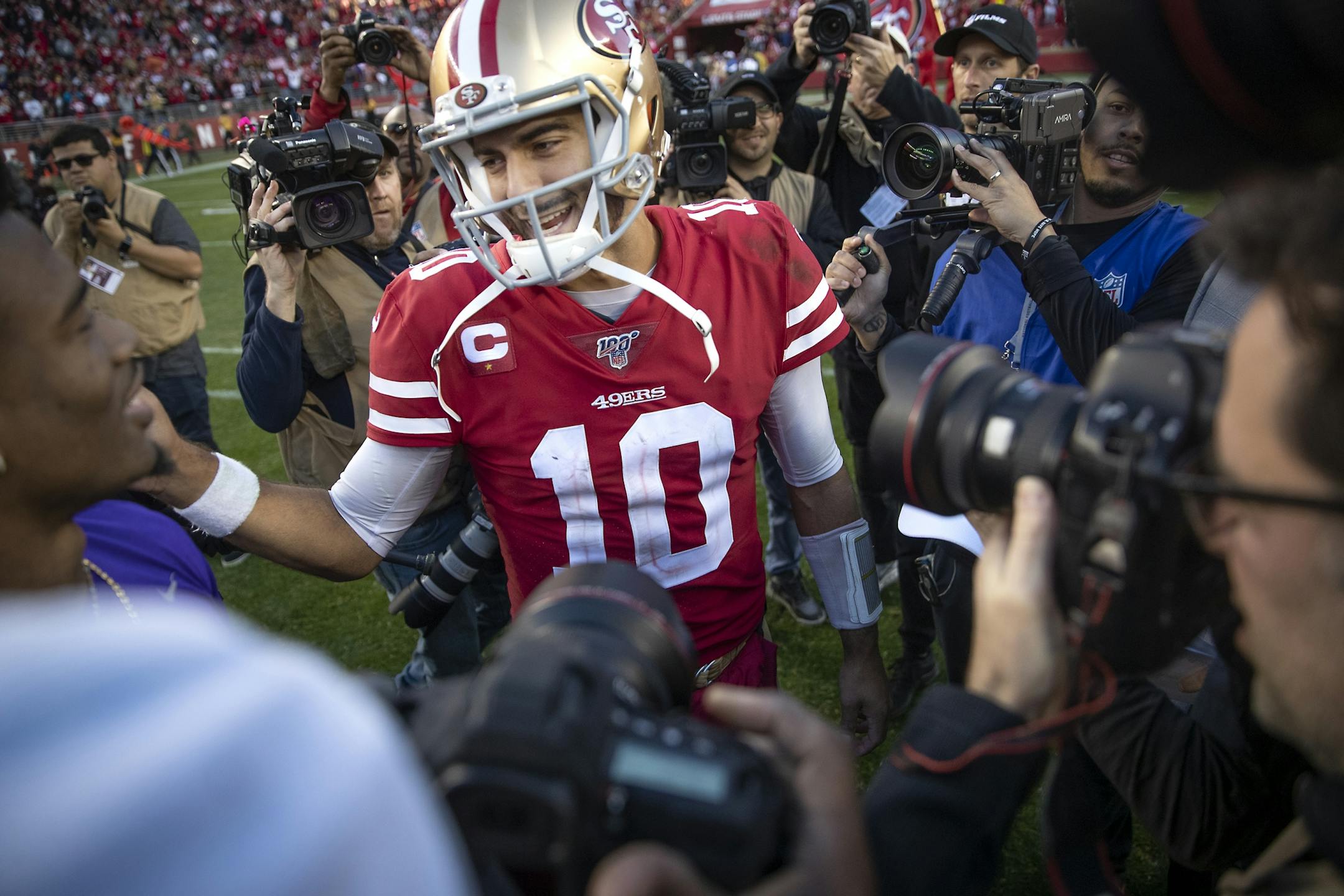 San Francisco 49ers quarterback Jimmy Garoppolo was all smiles while addressing players after defeating the Minnesota Vikings 27-10.