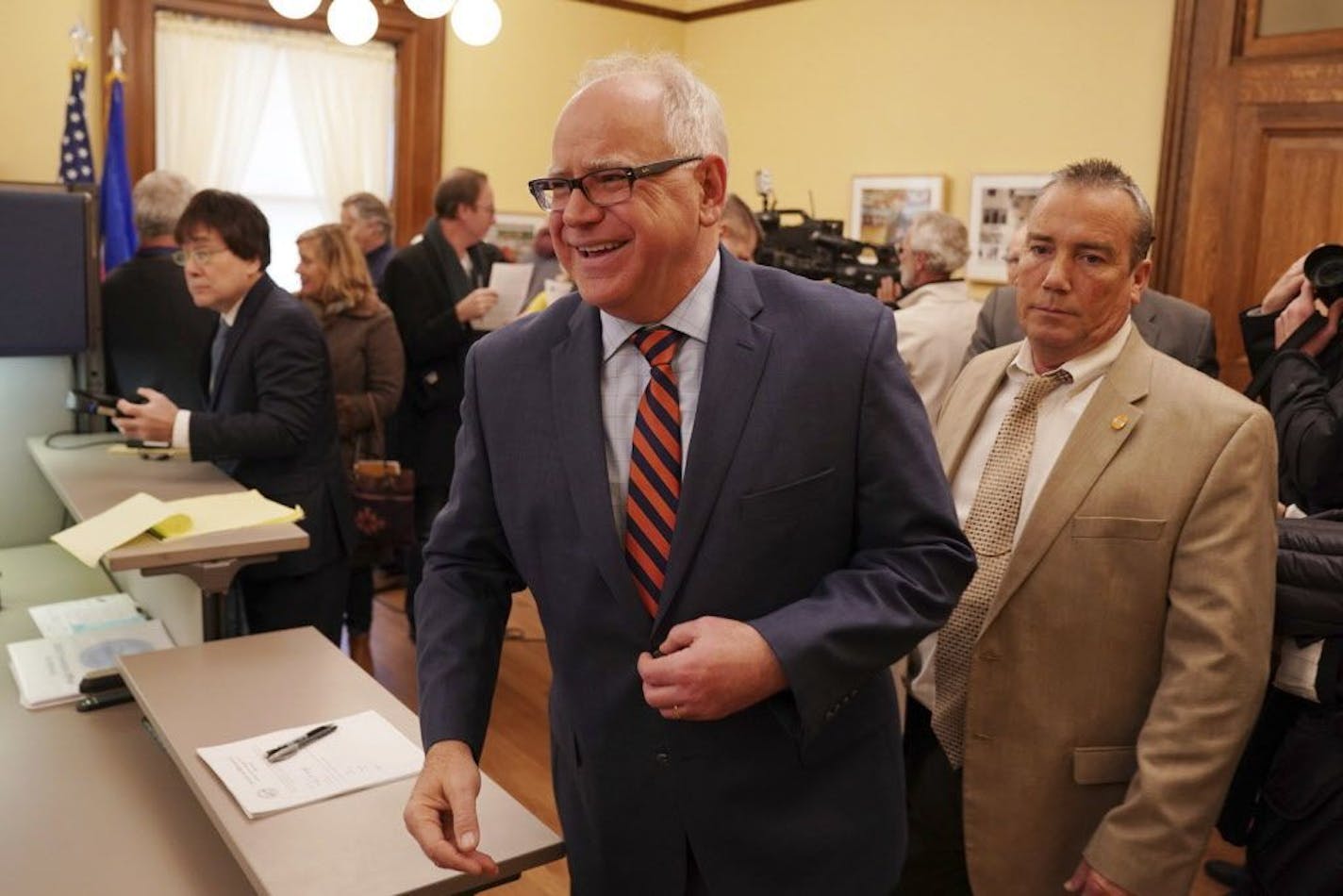 When Tim Walz is sworn in as governor in January, he will have a sizable budget surplus to start working on some of his campaign pledges.