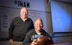 Minnetonka football head coach Dave Nelson, right, sat beside his father, former coach Stan Nelson