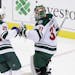 Wild defenseman Jonas Brodin celebrated with goaltender Kaapo Kahkonen after the goalie posted a 3-2 victory over the New Jersey Devils in his NHL deb