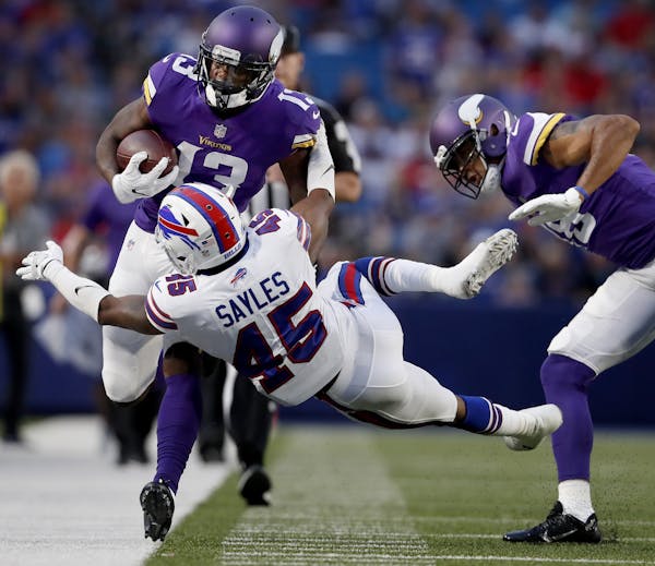 Minnesota Vikings receiver Stacy Coley (13) was pushed our of bounds by Marcus Sayles (45) in the second quarter.