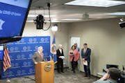 In a tightly pooled press conference, Minnesota Gov. Tim Walz provides an update on the state's next steps to respond to COVID-19 during a news confer