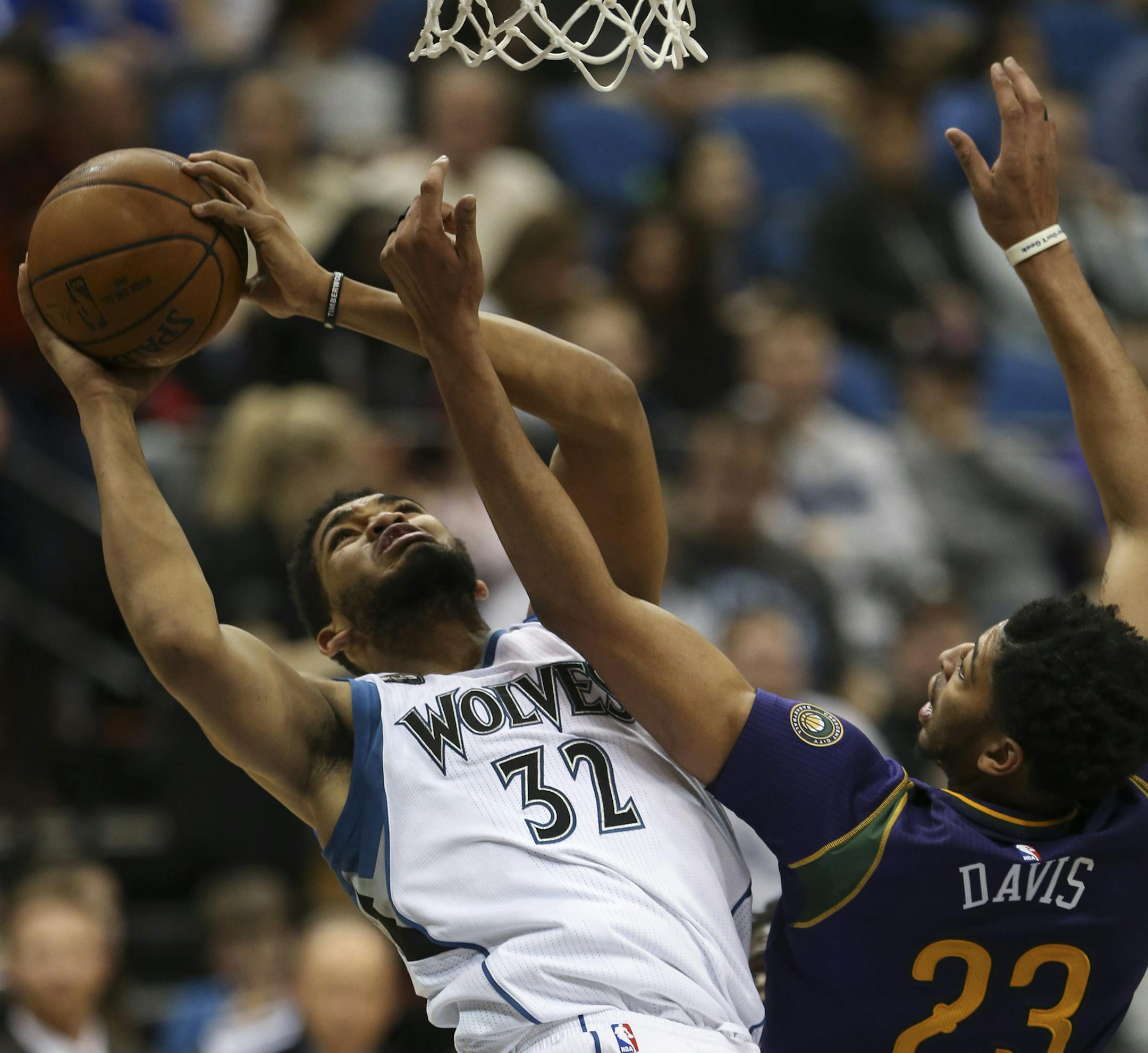 Timberwolves center Karl-Anthony Towns was fouled by Pelicans forward Anthony Davis as he shot in the in the third quarter. Towns led the Wolves with 19 points. ] JEFF WHEELER ï jeff.wheeler@startribune.com The Minnesota Timberwolves lost 116-102 to the New Orleans Pelicans in an NBA basketball game Monday night, February 8, 2016 at Target Center in Minneapolis.
