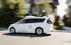 FILE &#x2014; A Waymo minivan with driverless technology in Mountain View, Calif., Aug. 25, 2017. Waymo, the driverless-technology company spun out of