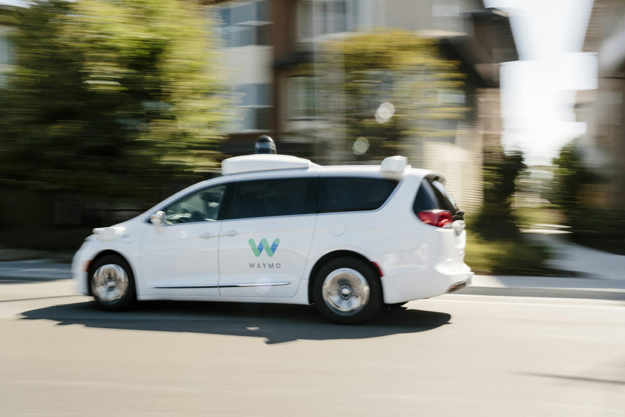 FILE — A Waymo minivan with driverless technology in Mountain View, Calif., Aug. 25, 2017. Waymo, the driverless-technology company spun out of Google, has agreed to purchase as many as 62,000 minivans from Fiat Chrysler Automobiles for use in a ride-hailing service set to begin commercial operations later in 2018. (Jason Henry/The New York Times)
