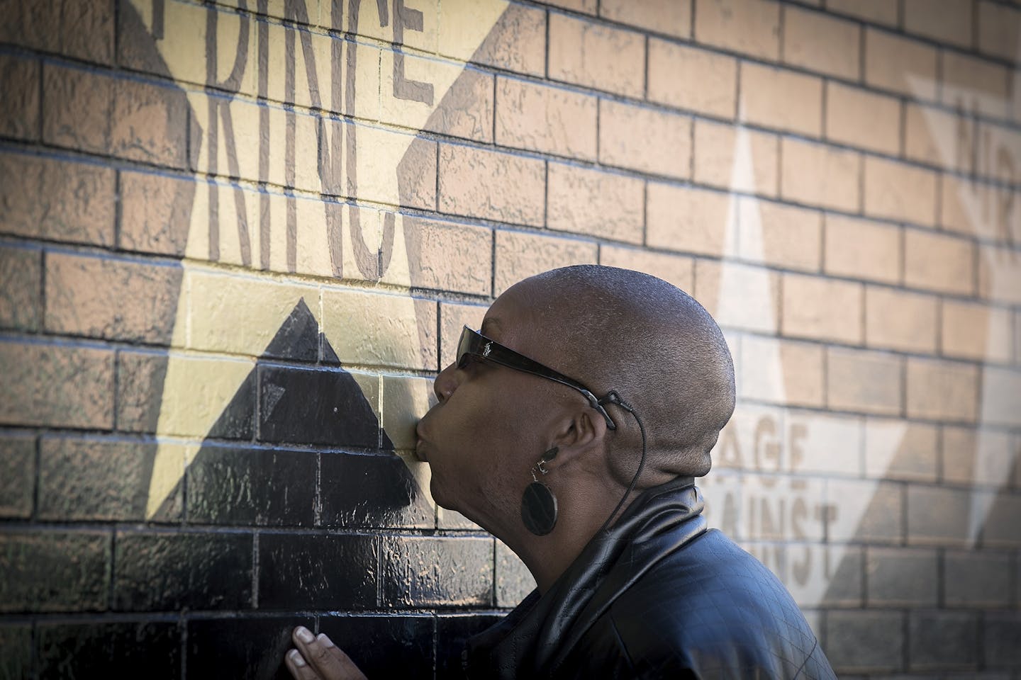 Ingrid Hicks of Milwaukee kissed the Prince star on First Avenue to remember him on the first anniversary of his death Friday. "There's no way we would have missed this," said Hicks, who was there with Thomas Brooks.