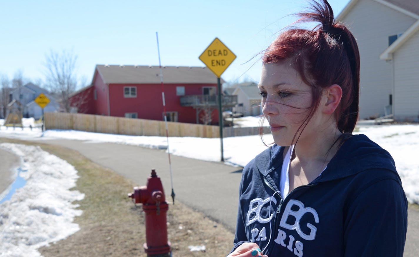 This is the house where a mother and her 2 children were found in Zimmerman Minn. Sunday March 31, 2013. Ariana Johnson 15 years old knew and mentored through a school program one of the children who died. The house where the three died is in the background..] Richard.Sennott@startribune.com Richard Sennott/Star Tribune. , Zimmerman Minn. Monday 4/1/13) ** (cq)