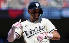 Twins third baseman Royce Lewis reacts after hitting a single during the sixth inning Sunday at Target Field. Lewis ended an 0-for-36 skid with his fi