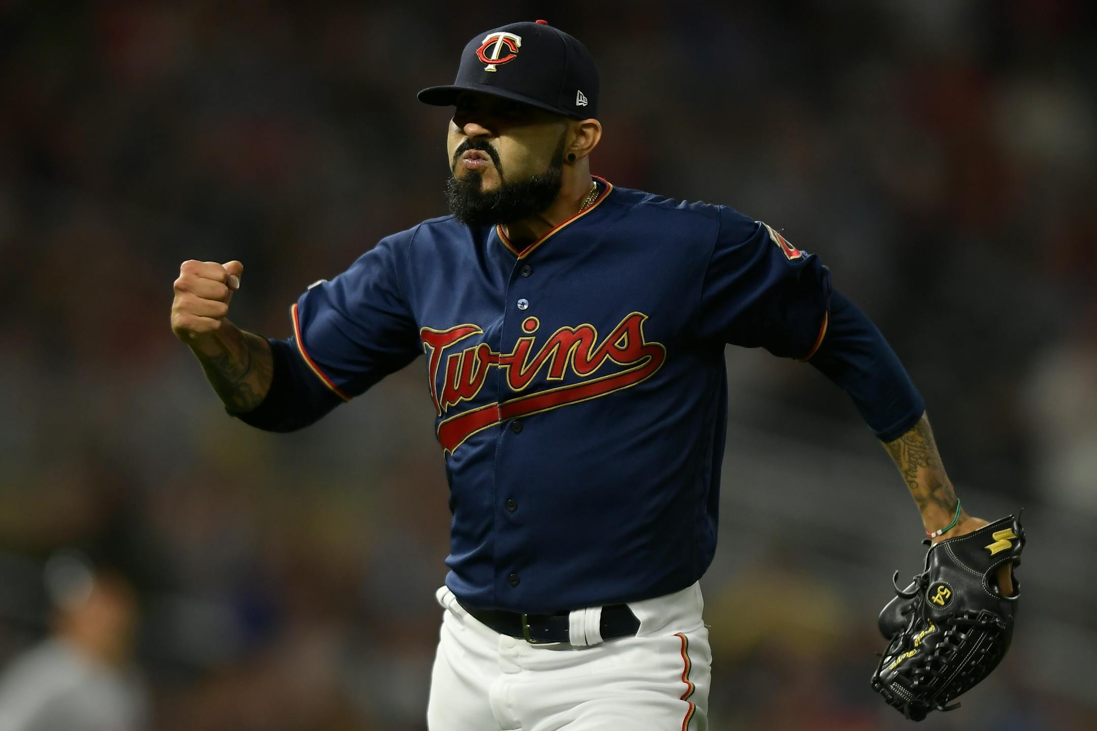 Twins relief pitcher Sergio Romo celebrated after the end of the top of the sixth inning against the Cleveland Indians.