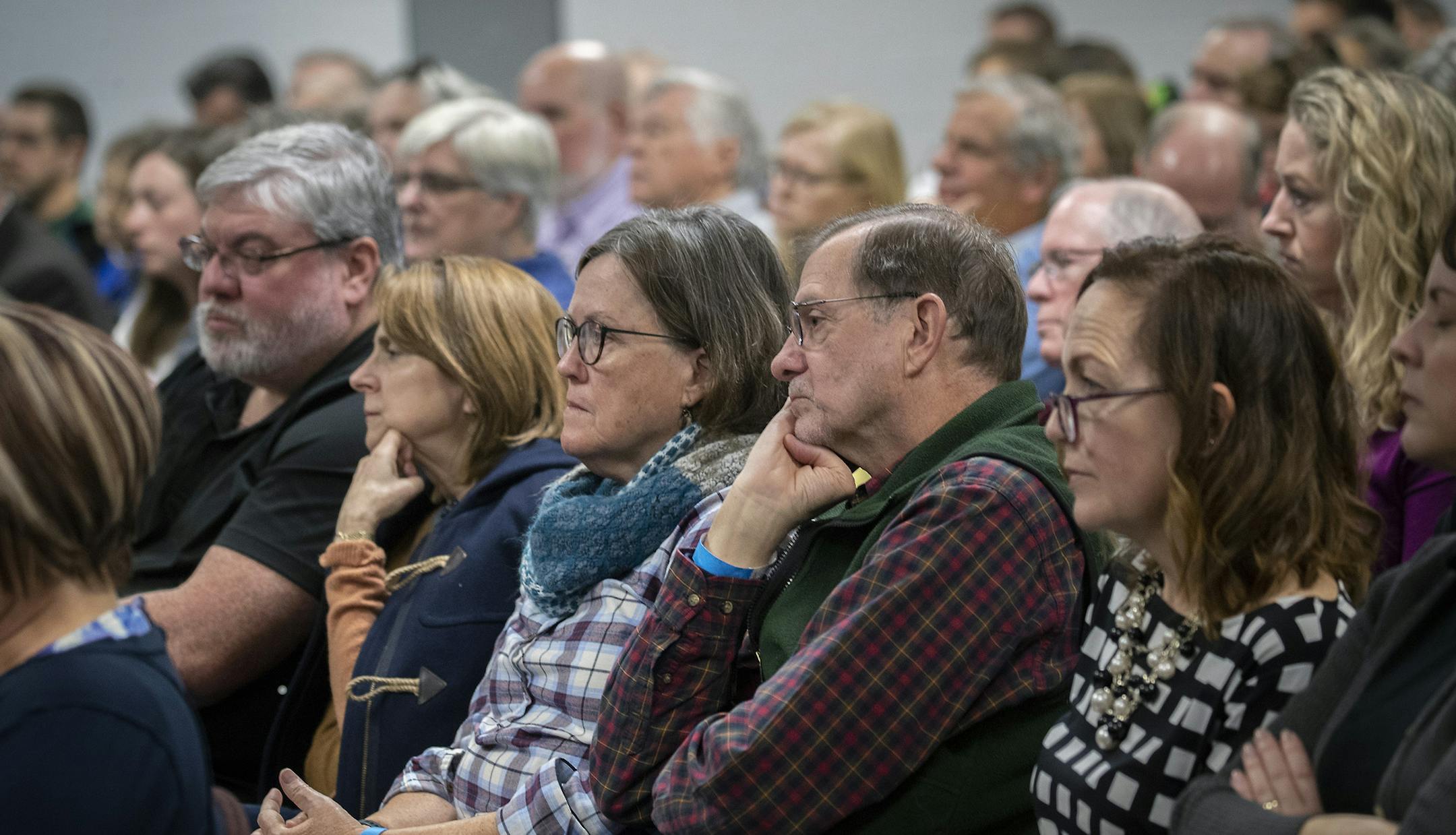 A crowd listened as Democrat Angie Craig, left, and Republican Jason Lewis, debated for the last time as they battle for Minnesota's Second Congressional District at the Dakota Technical College, Thursday, March 25, 2018 in Rosemount, MN. ] ELIZABETH FLORES ï liz.flores@startribune.com