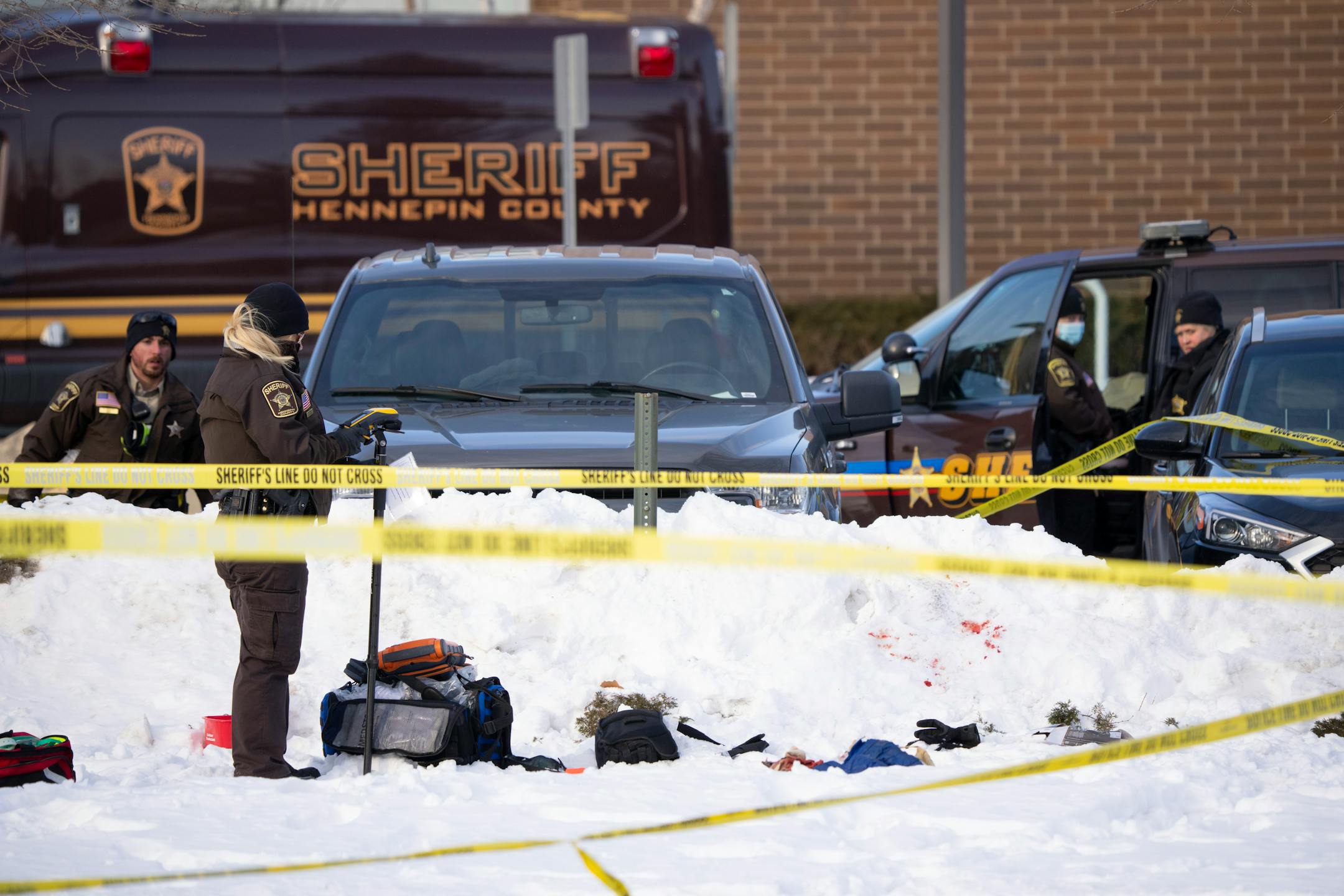 Investigators from Hennepin County Sheriff's office began processing the scene of the shooting Tuesday afternoon, February 1, 2022 at the South Education Center, an alternative school in Richfield, Minn. Two students were shot, one of them fatally, outside the South Education Center, an alternative school Tuesday afternoon. ] JEFF WHEELER • Jeff.Wheeler@startribune.com