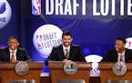 NBA basketball players, from left, Washington Wizards' Bradley Beal, Minnesota Timberwolves' Kevin Love and Portland Trailblazers' Damian Lillard repr