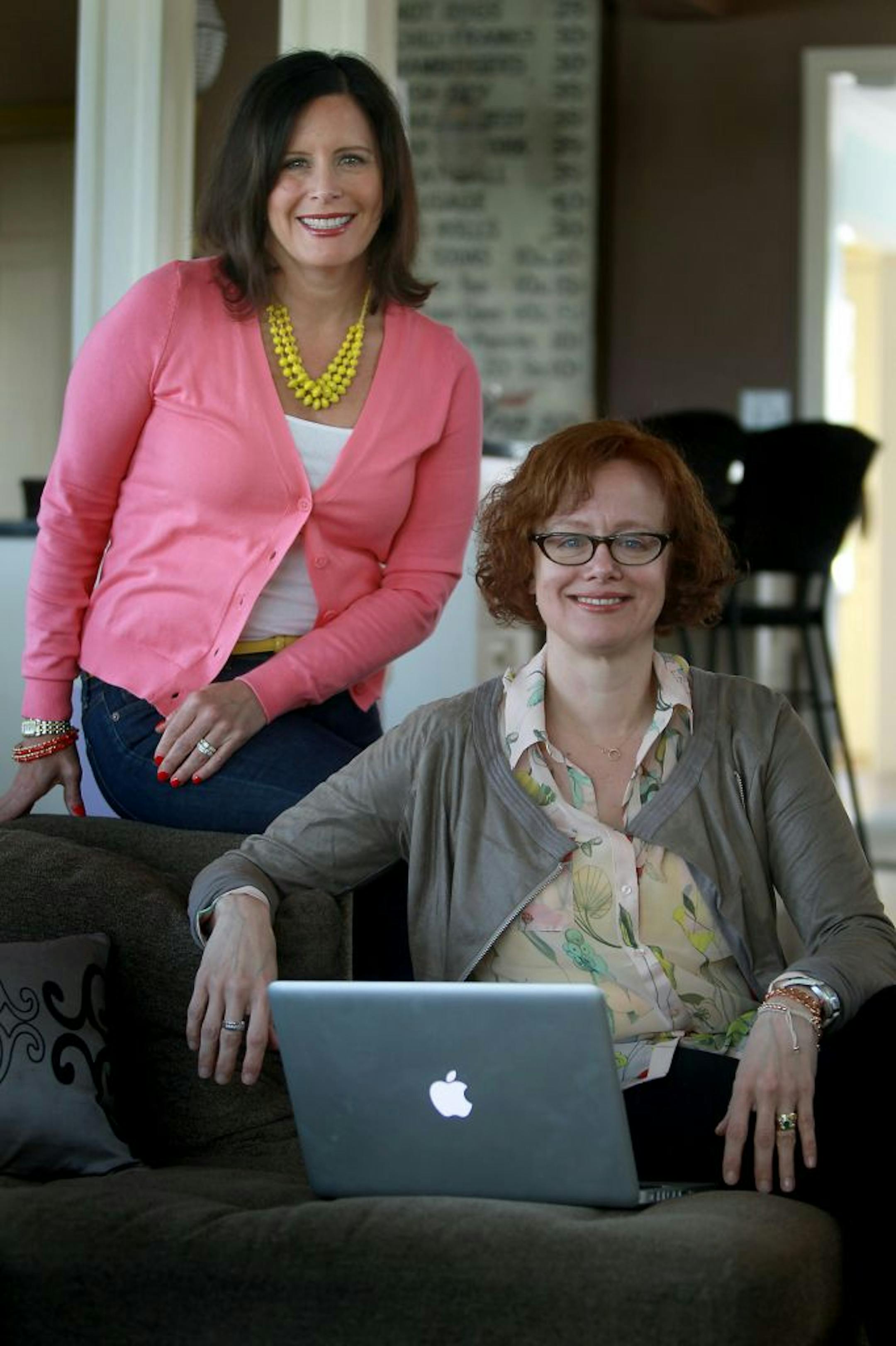 Beth Perro-Jarvis, left, and Mary Van Note, partners in Ginger, a research consulting group in Minneapolis, who do an annual "What Women Want" survey, worked from Perro-Jarvis' home, Tuesday, April 17, 2012 in Minneapolis, MN. Local consumer-research duo Ginger found some interesting updated answers to the age-old question, �what do women want?� after conducting their annual survey of �alpha� women trendsetters in key markets around the country (including here). For example, they could easily li