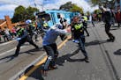 Victoria police clashed with protesters during a Rally for Freedom in Melbourne, Australia, on Saturday, Sept. 18, 2021. The protesters were demonstra