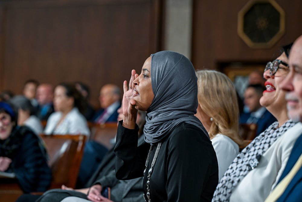 Rep. Ilhan Omar, D-Minn., reacts to President Donald Trump's State of the Union address at the U.S. Capitol in Washington, D.C., on Tuesday evening.