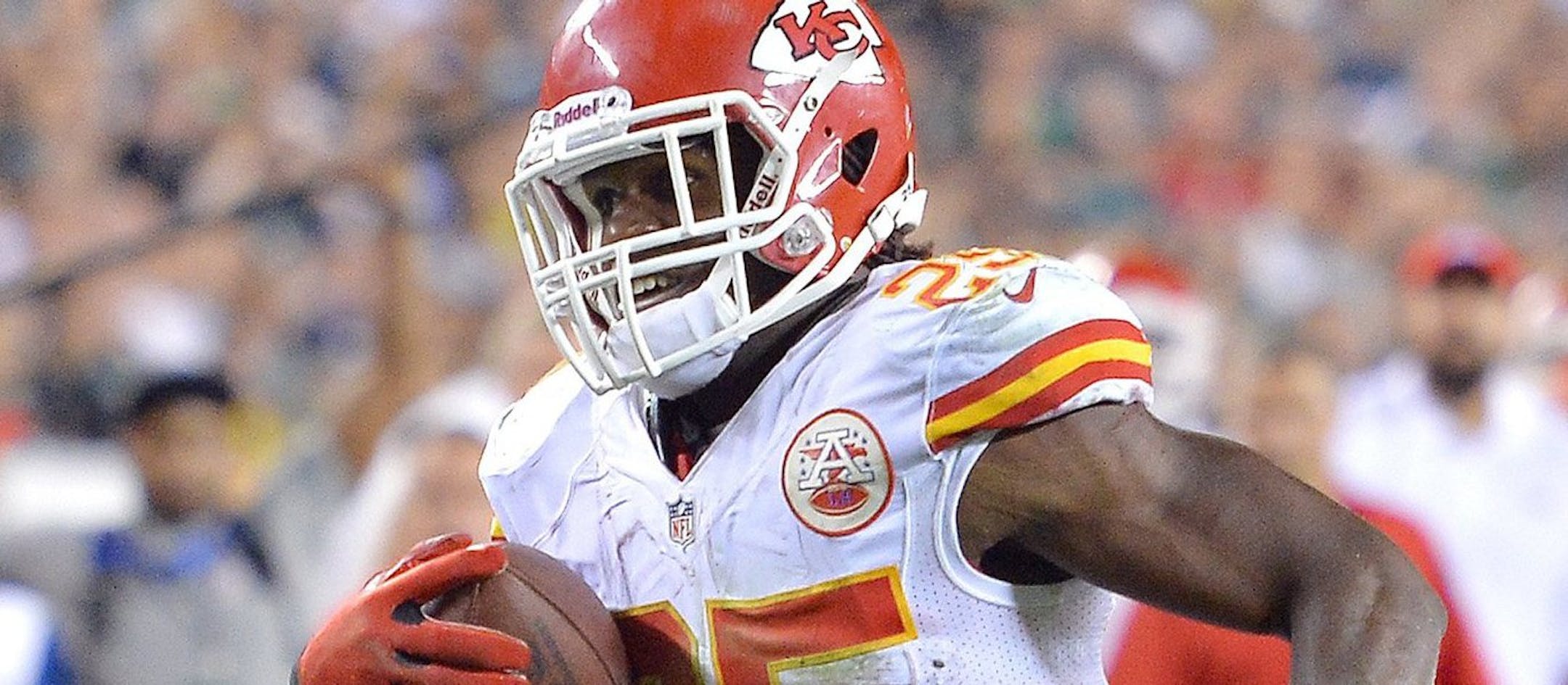 Kansas City Chiefs running back Jamaal Charles (25) avoids Philadelphia Eagles strong safety Nate Allen (29) on a 3-yard touchdown run in the fourth quarter at Lincoln Financial Field in Philadelphia, Pennsylvania, on Thursday, September 19, 2013. The Chiefs won, 26-16. (John Sleezer/Kansas City Star/MCT)