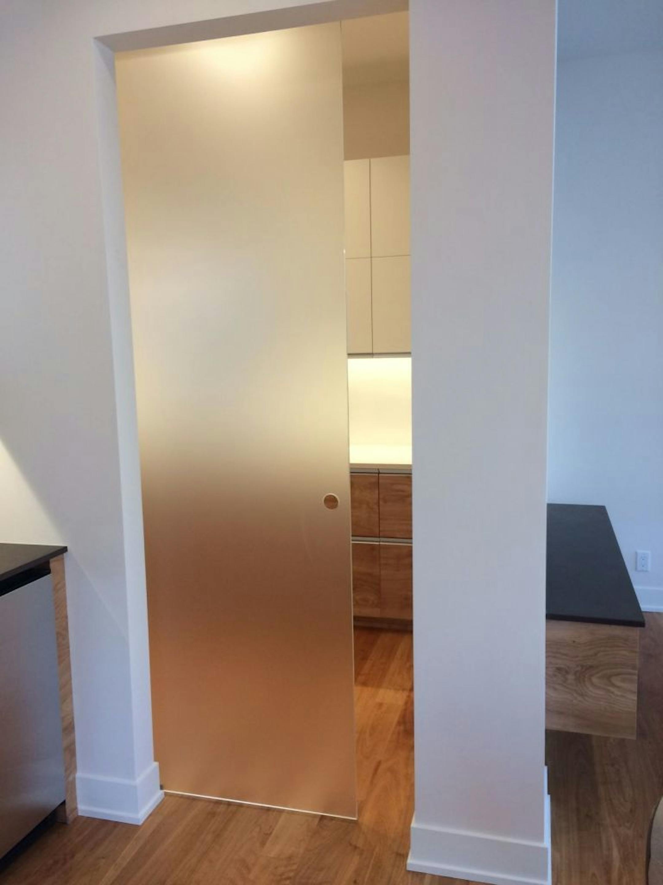 One of four sliding glass barn doors in the Orono Dream Home.