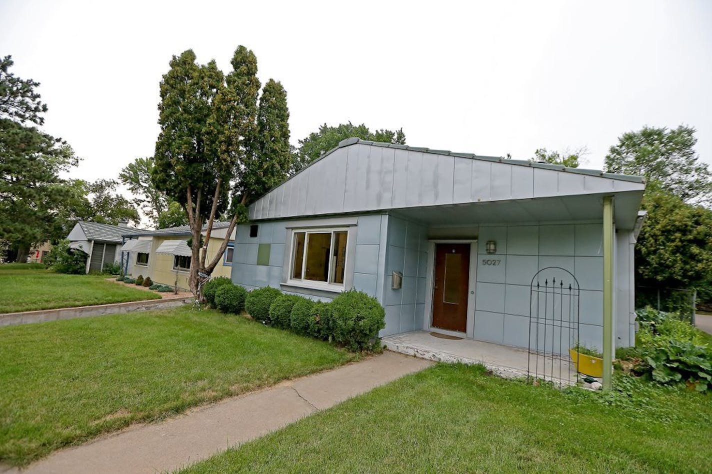 Buck Holzemer's 1950 historic Lustron home, Thursday, August 18, 2016 in Minneapolis, MN. His home is lined along a small strip on Nicollet Ave., which he has restored and preserved.