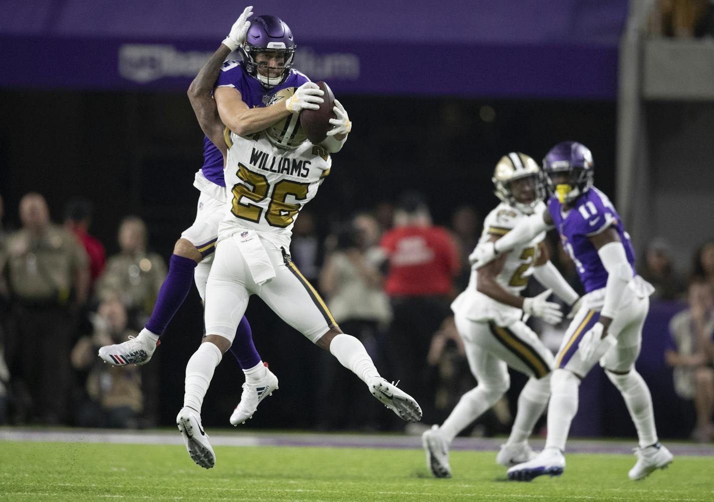 Minnesota Vikings wide receiver Adam Thielen (19) caught a 14 yard first down over New Orleans Saints cornerback P.J. Williams (26) in the first quarter at U.S. Bank Stadium Sunday October 28, 2018 in Minneapolis, MN.