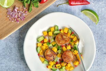 Pan-Seared Scallops with Mango Cucumber Salsa. Meredith Deeds photo