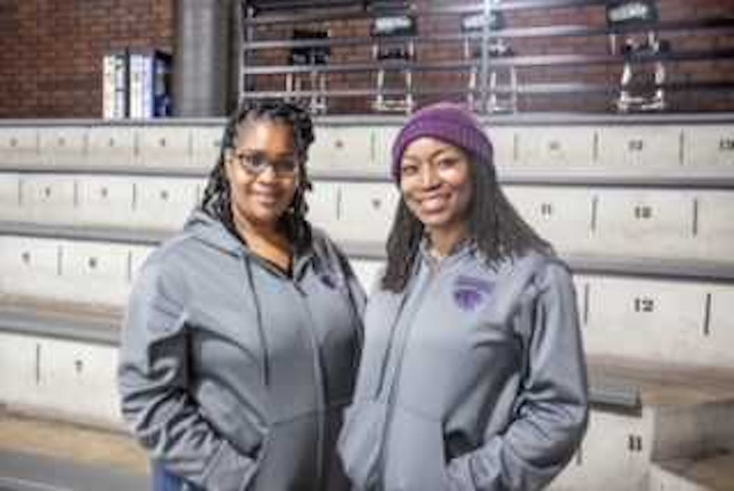 April Scott, left, and Rochelle Popyon, hockey mothers from California, helped pull the Panthers team together.
