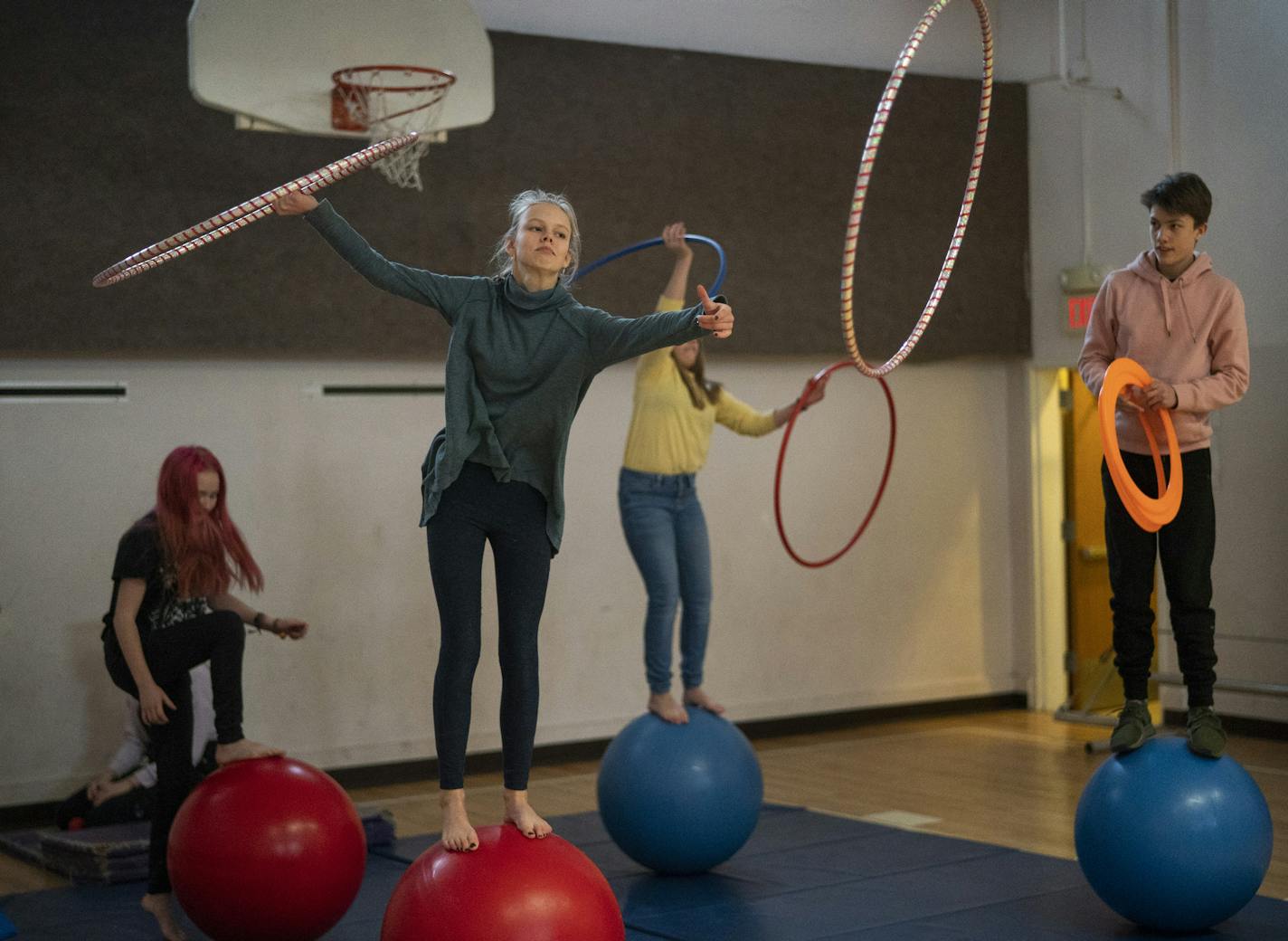 At City of Lakes Waldorf School in Minneapolis, which was in session Thursday, students, from left, Lila Slichter, Mayla Burnstein, Bohden Cervenka and Kadin Black tried circus routines.