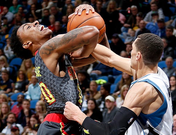 Jeff Teague (0) was fouled by Zach LaVine (8) in the second quarter.