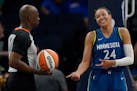 Minnesota Lynx forward Napheesa Collier (24) gestures towards a referee during overtime of a WNBA basketball game against the Atlanta Dream, Friday, S