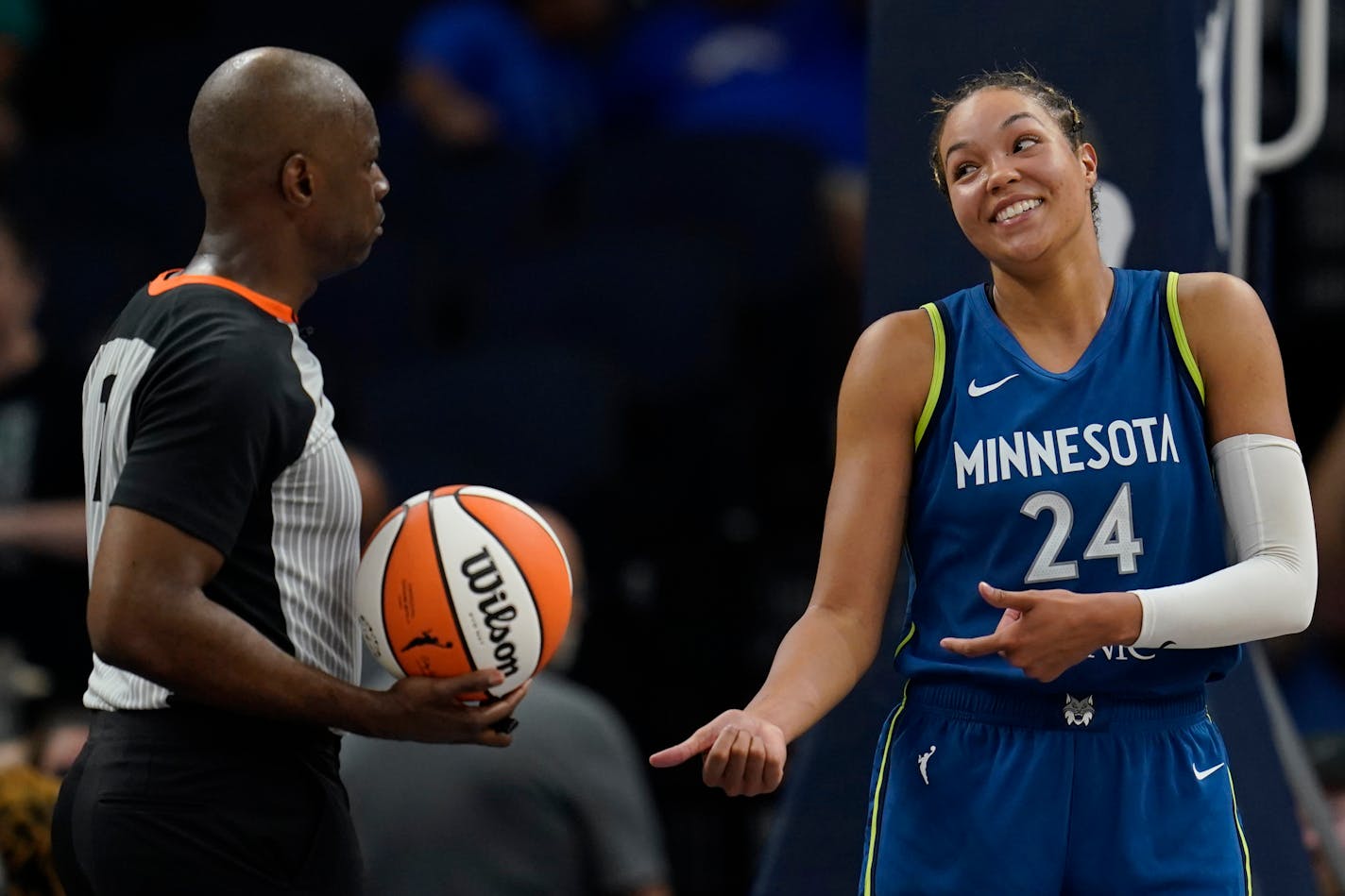 Minnesota Lynx forward Napheesa Collier (24) gestures towards a referee during overtime of a WNBA basketball game against the Atlanta Dream, Friday, Sept. 1, 2023, in Minneapolis. (AP Photo/Abbie Parr)