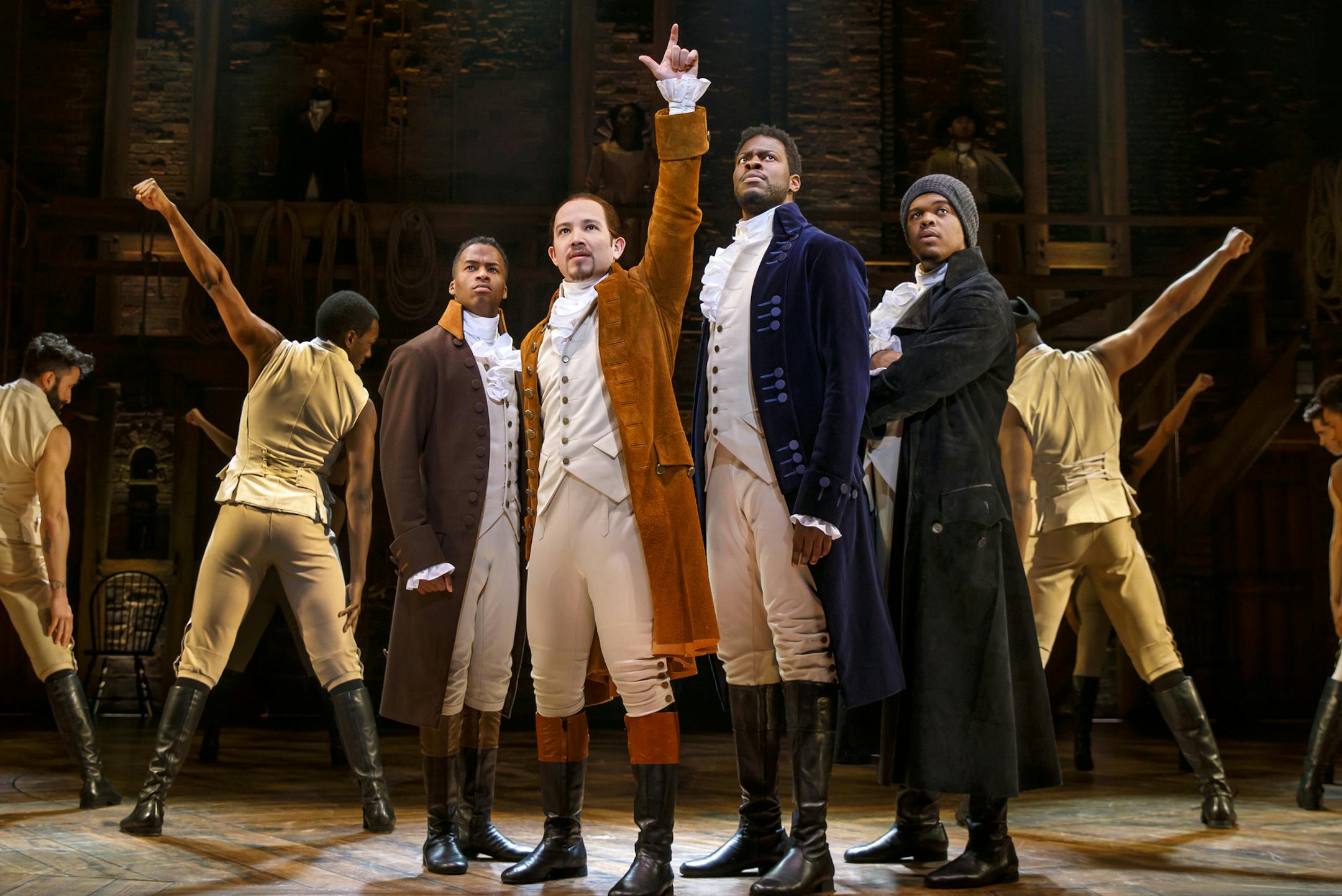Joseph Morales (center) as Hamilton and Klye Scatliffe as Layfayette/Jefferson in "Hamilton."