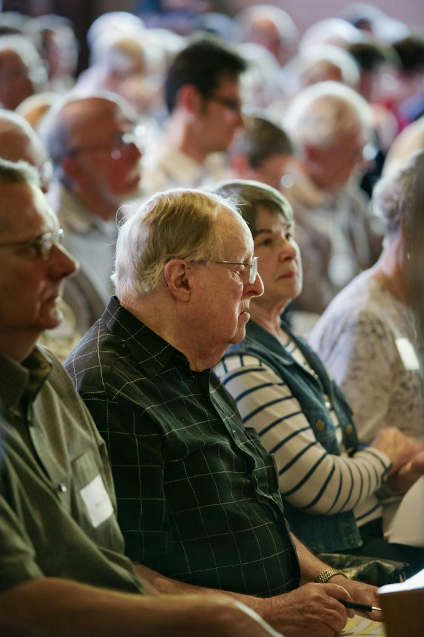 Max Maguire was one of the many Presbyterians gathered at the Peace Presbyterian Church in St. Louis Park to hear the proposal.