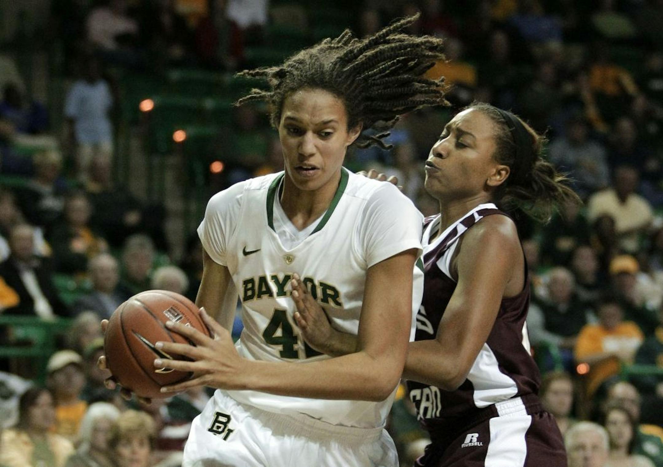 Baylor center Brittney Griner, left