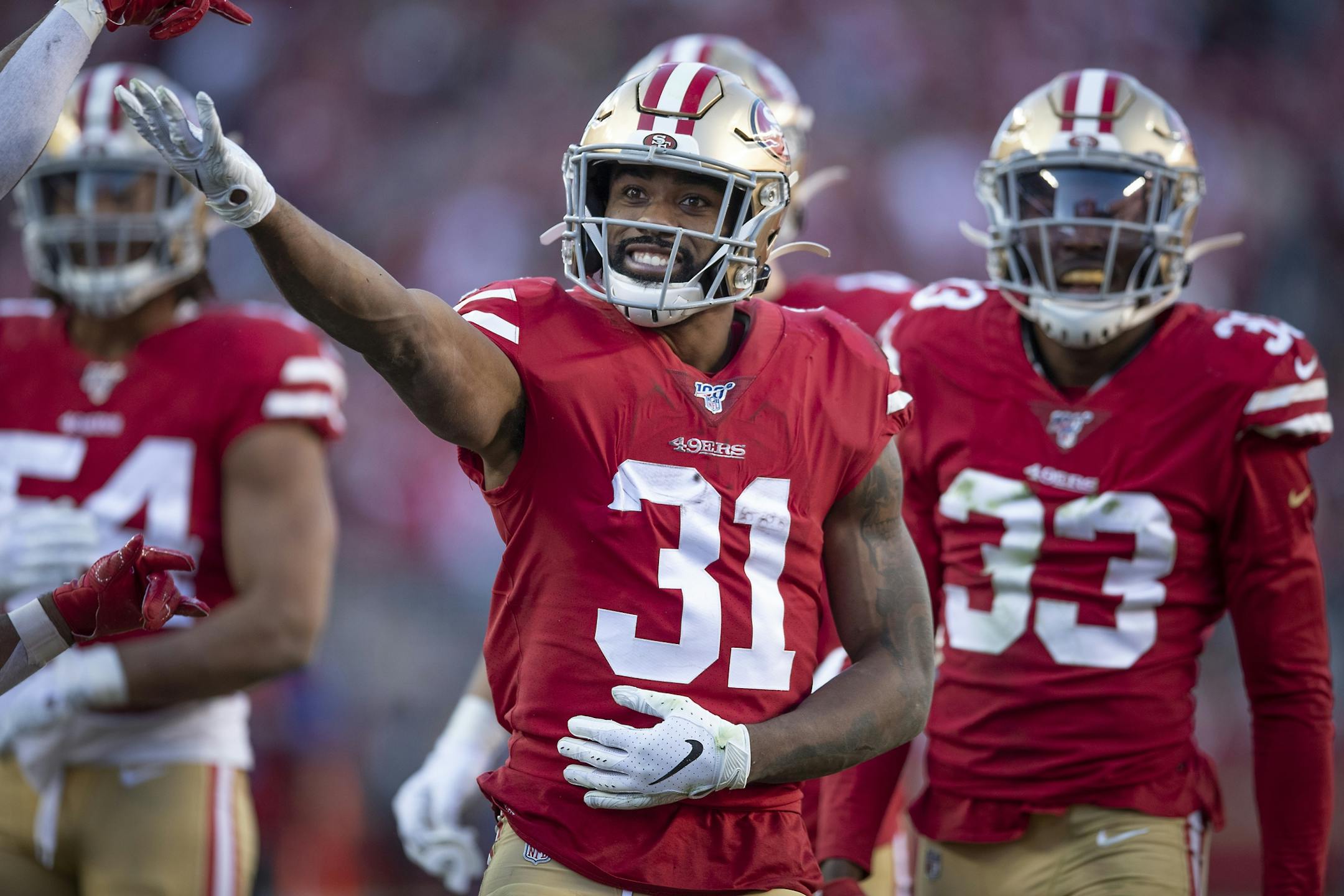 San Francisco 49ers running back Raheem Mostert celebrated after he recovered a fumble after Minnesota Vikings defensive back Marcus Sherels drops it in a return in the third quarter.