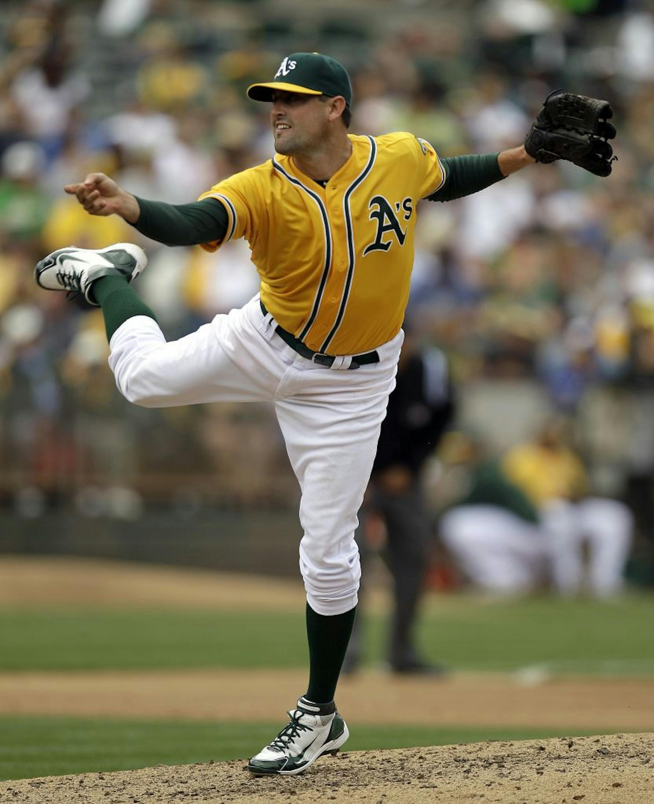 Oakland Athletics' Pat Neshek works against the Toronto Blue Jays in the sixth inning of a baseball game onSaturday, Aug. 4, 2012, in Oakland, Calif.