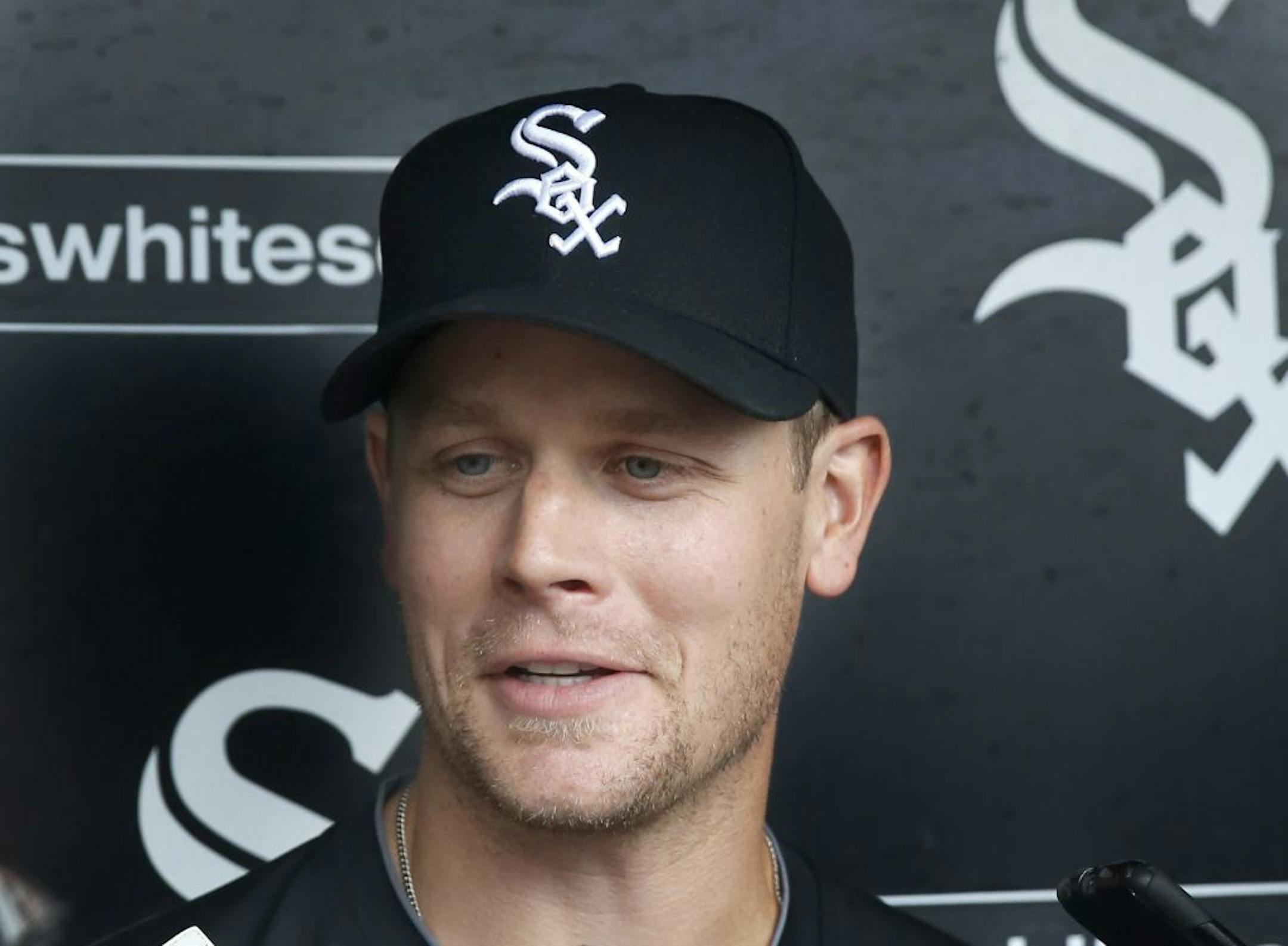 Justin Morneau talks with reporters before an interleague baseball game against Washington Nationals after the Chicago White Sox signed the veteran first baseman Thursday, June 9, 2016, in Chicago.
