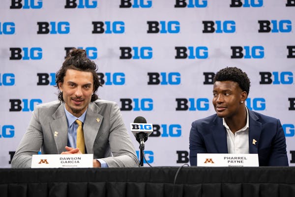 Gophers forwards Pharrel Payne, right, and Dawson Garcia spoke to reporters during Big Ten media day at Target Center on Tuesday.
