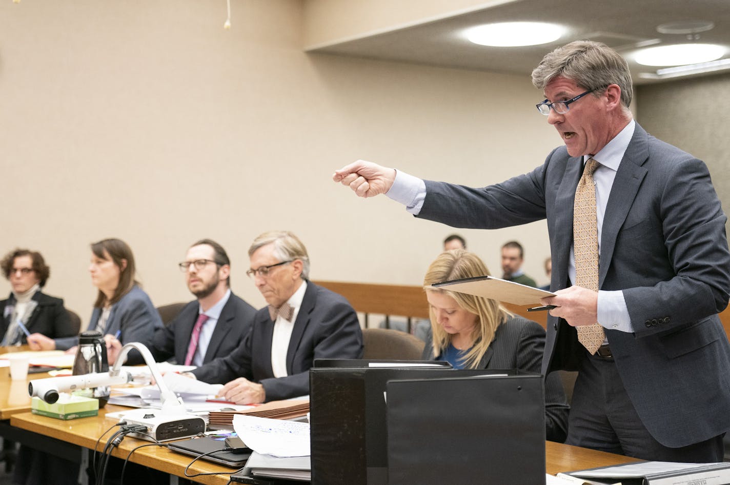 Attorney Jack Perry argues for a temporary restraining order. ] LEILA NAVIDI &#x2022; leila.navidi@startribune.com BACKGROUND INFORMATION: Judge Joseph Klein will decide whether to grant a temporary restraining order to delay the passing of the Minneapolis 2040 Comprehensive Plan in Hennepin County District Court on Thursday, December 6, 2018. A group filed a suit days before the vote claiming the plan has the potential for negative environmental effects in the city.